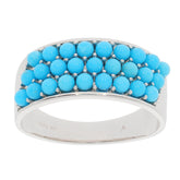 Round Blue Turquoise Sterling Silver Ring with multiple gemstone accents, showcasing elegant craftsmanship and vibrant color.